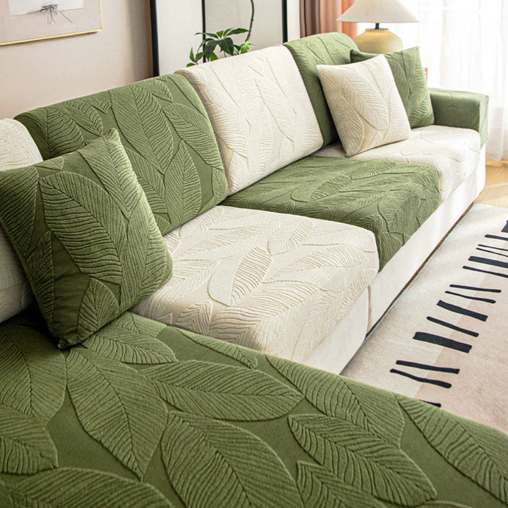 Close-up of water-repellent modern leaf jacquard sofa cover, showcasing pet-friendly anti-scratch fabric.