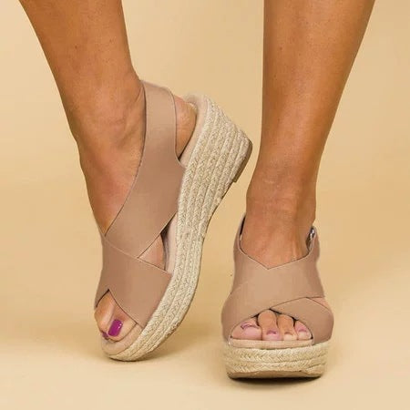 Women's orthopedic wedge sandals with comfortable closed toe design, perfect for elegant summer footwear.