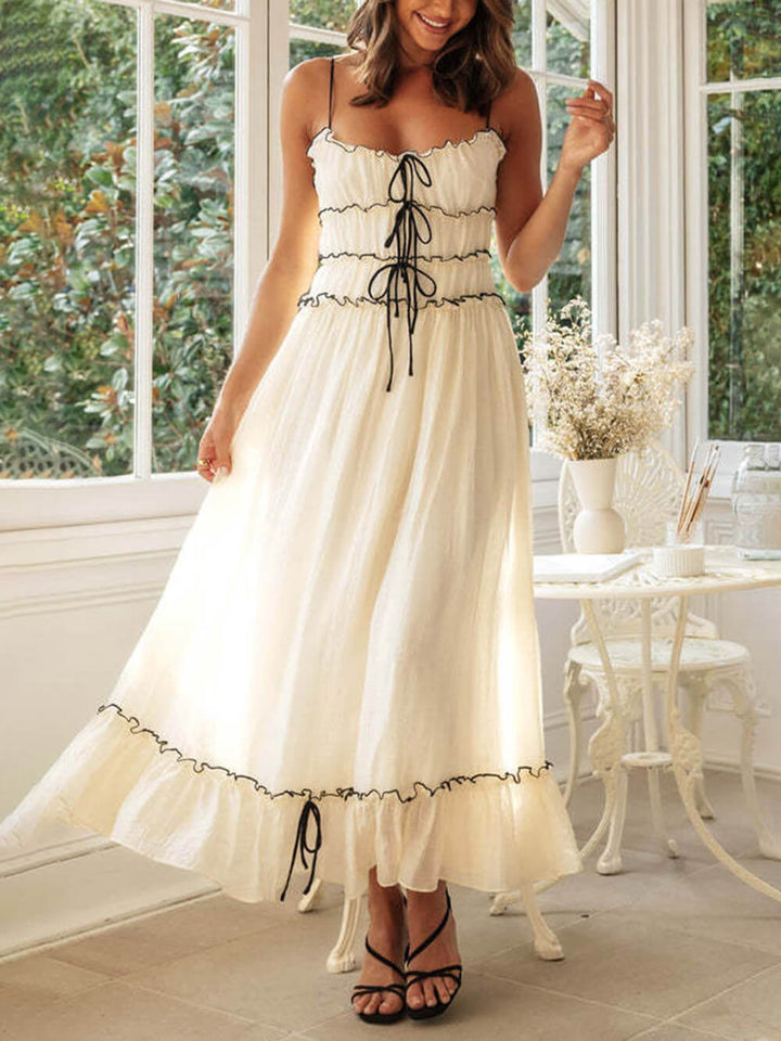 Boho midi dress for women, sleeveless and white, featuring adjustable spaghetti straps. Perfect sundress.