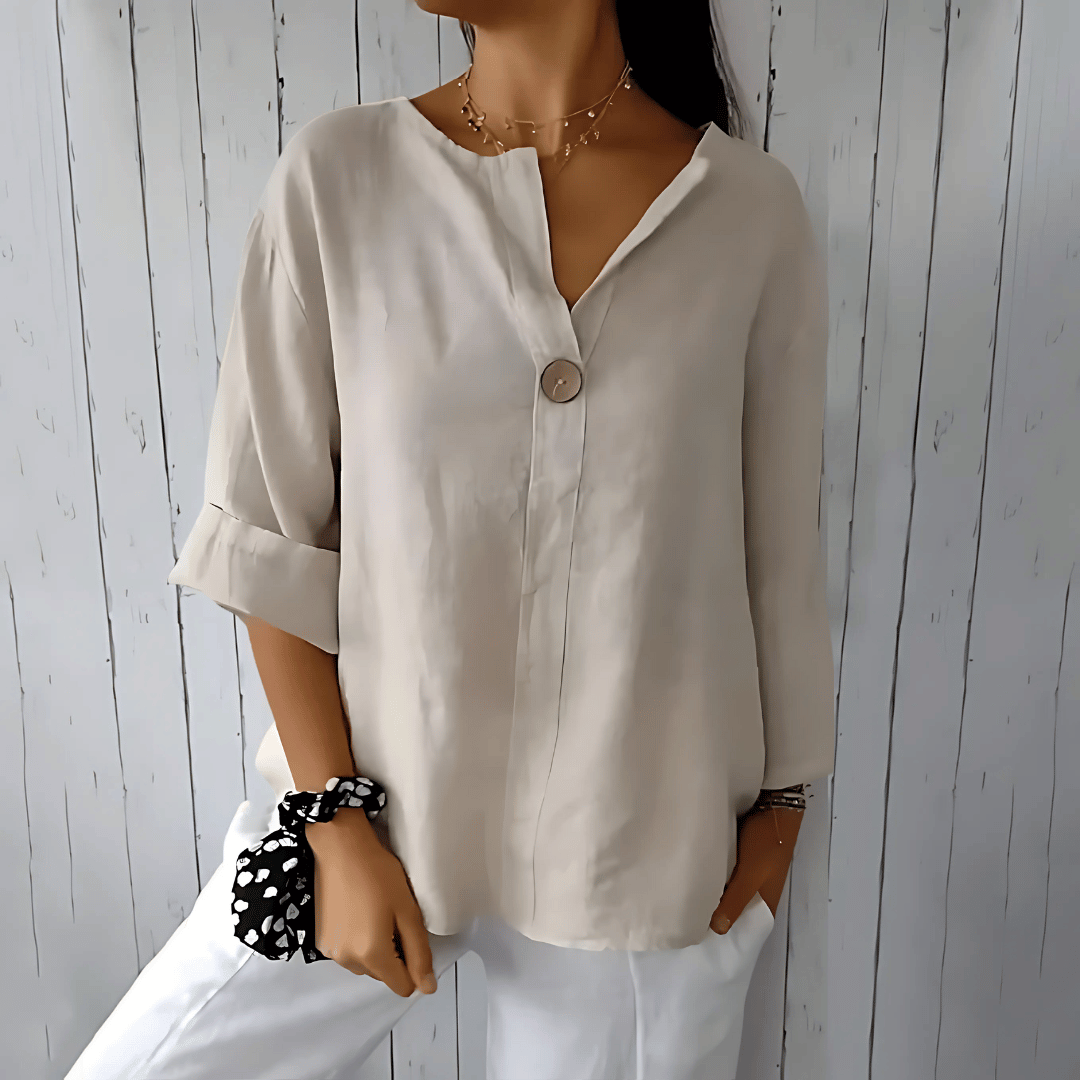 Comfortable V-neck loose fit women's summer blouse in beige. Ideal for everyday fashion & elegant casual wear. Plus size friendly.