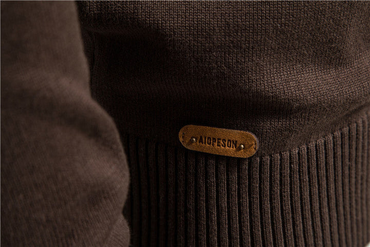 Contemporary men's zip cardigan with a unique colorblock pattern.