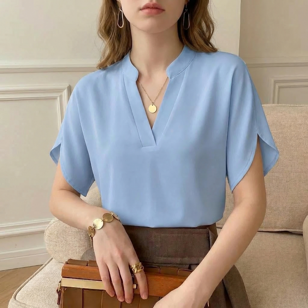 Premium women's elegant flowing blouse, ideal for office or party. Stylish and comfortable womenswear top.