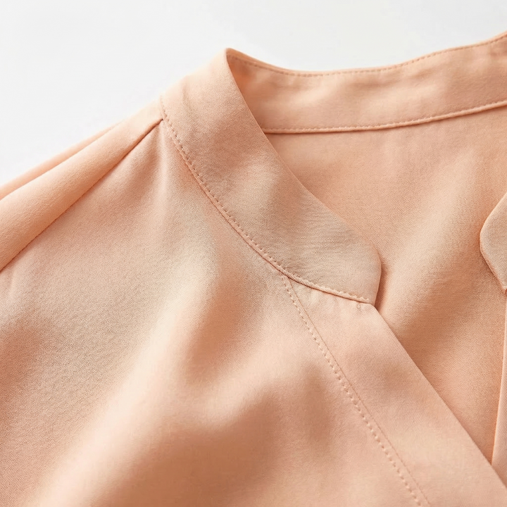 Elegant women's flowing blouse, a versatile top for office, party, or casual fashion. Comfortable womenswear.