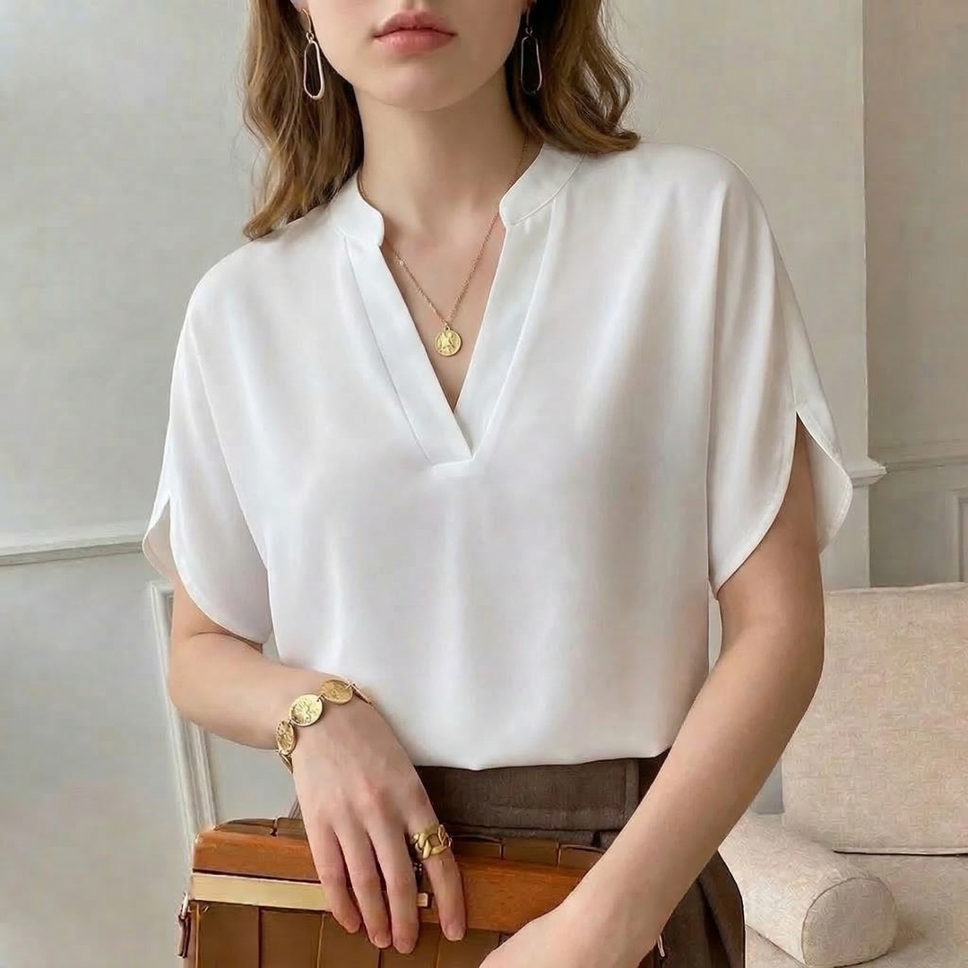 Versatile women's flowing blouse for casual or office style. Comfortable, elegant premium fashion top.