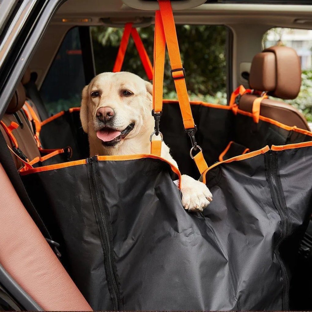 Black universal waterproof quilted pet back car seat cover for dogs, protecting vehicle interior during travel. Easy clean.