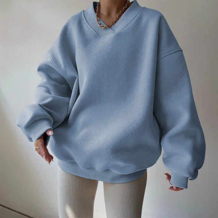 Soft, comfortable women's oversized pullover with relaxed fit, made for ultimate coziness and everyday loungewear.