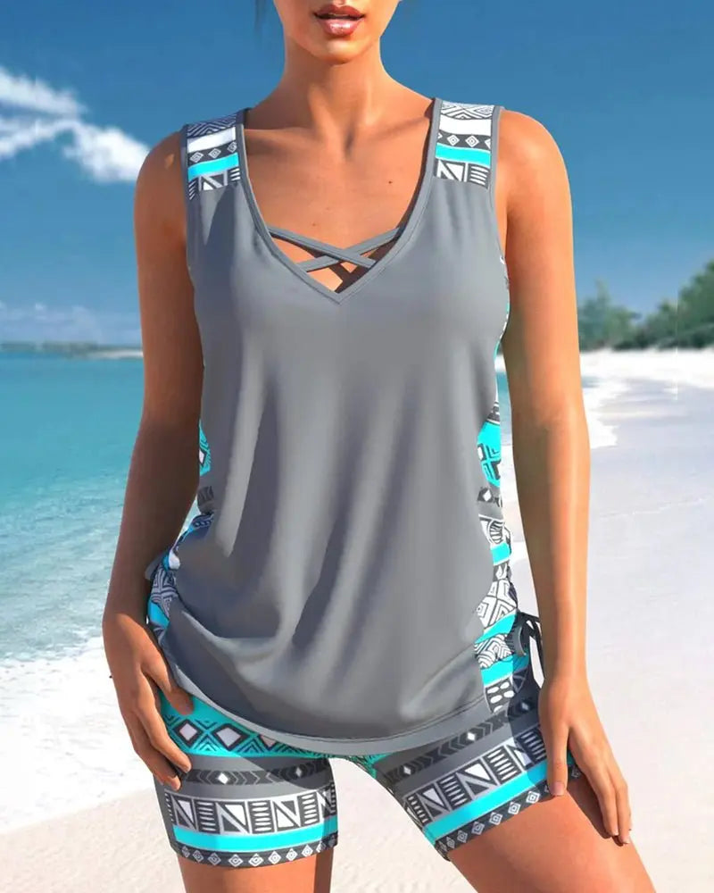 Women's stylish tankini swimsuit set with tummy control, adjustable straps, perfect for beachwear & pool fashion.