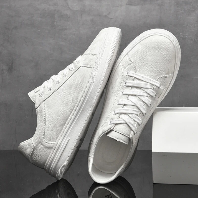 Durable men's footwear: everyday comfort sneakers available in black, sand, and white versatile colors.