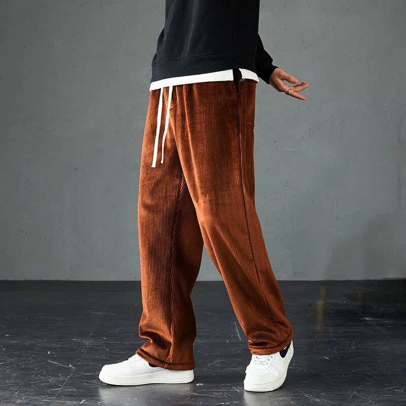 Men's soft corduroy joggers, perfect for casual comfort wear. Features an elastic waist and straight leg design.