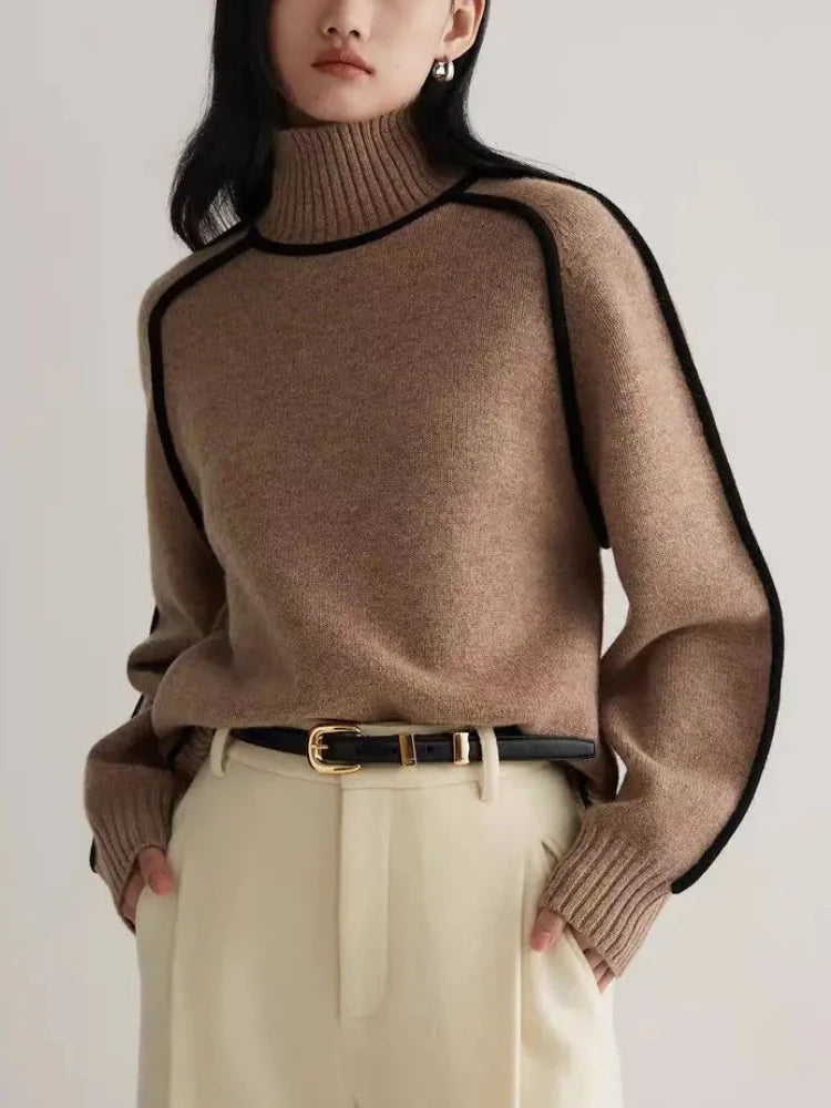 Women's cozy turtleneck sweater with stylish contrast seams. Relaxed fit for effortless fall fashion.