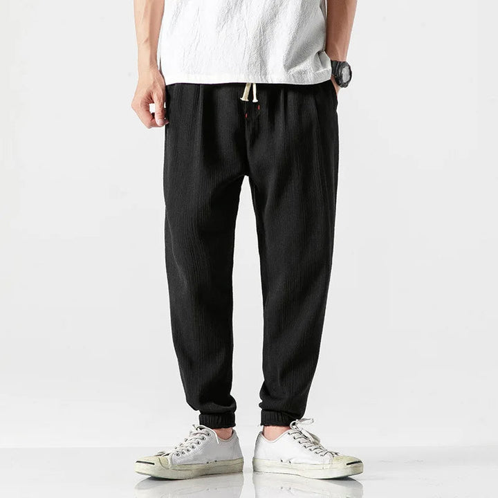 Stylish men's relaxed fit tapered joggers, versatile for gym, casual outings, active wear or comfortable home wear.