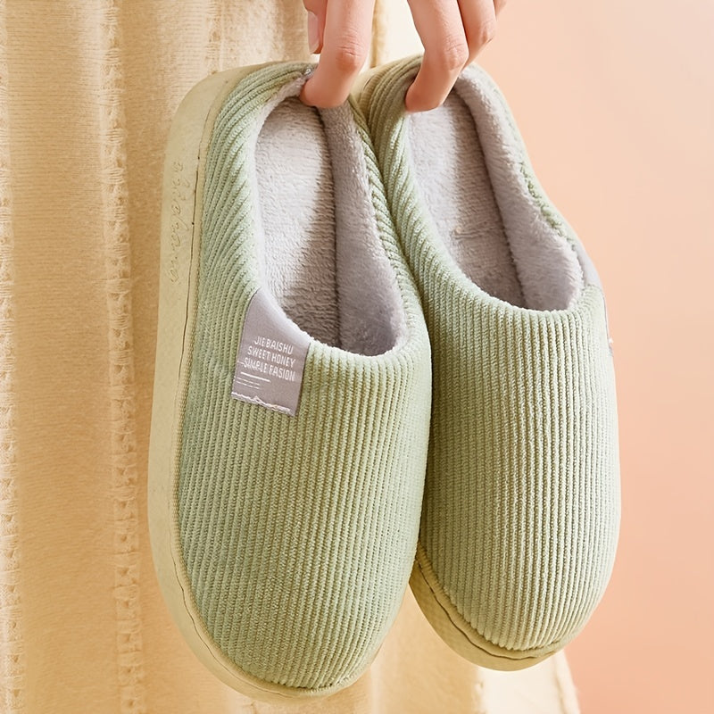 Soft women's indoor slippers with plush lining and non-slip soles, perfect for relaxing home wear.