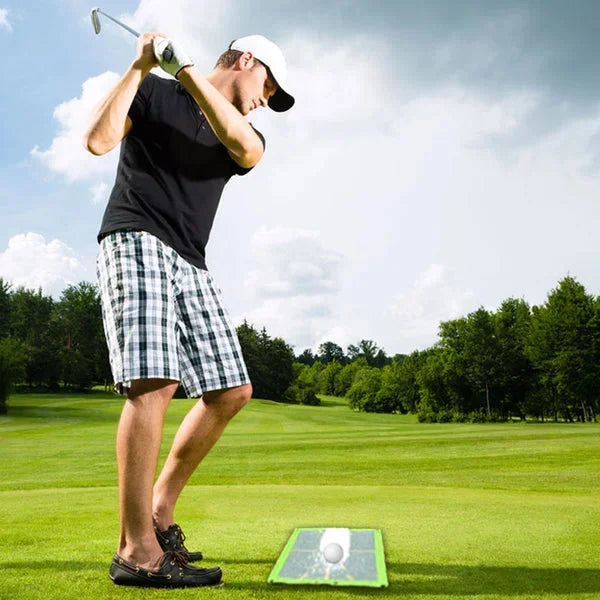 Durable golf practice mat for swing training, showing divot marks; great for indoor golf & outdoor golf improvement.
