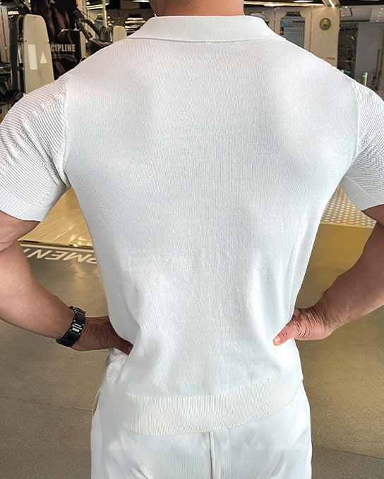 Man wearing a Cooling Performance Polo Shirt, demonstrating its comfortable fit and smart casual appeal.