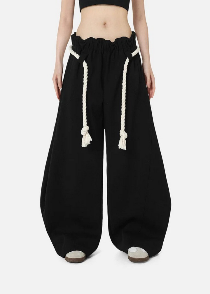 Baggy, oversized women's barrel leg sweatpants with a high elastic waist, offering ultimate comfort and style.