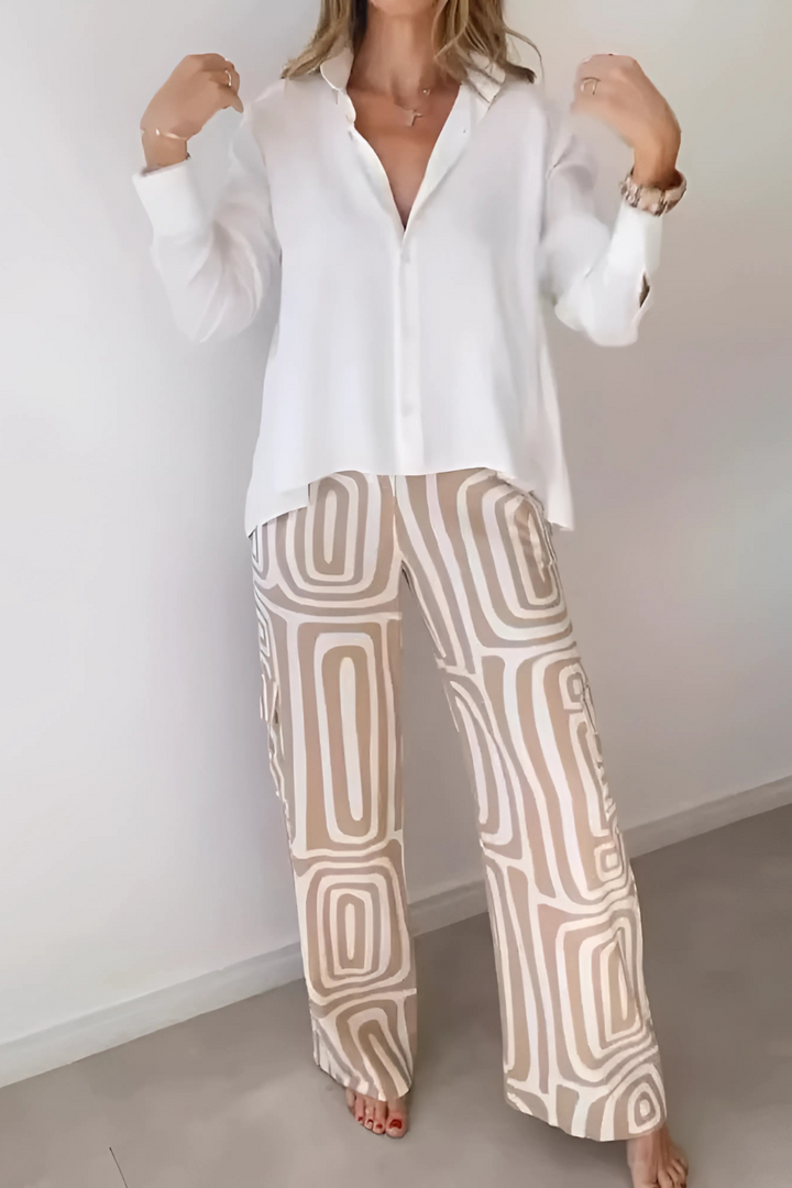 Stylish women's coordinated two-piece suit with wide-leg pants, versatile for professional work or casual chic.