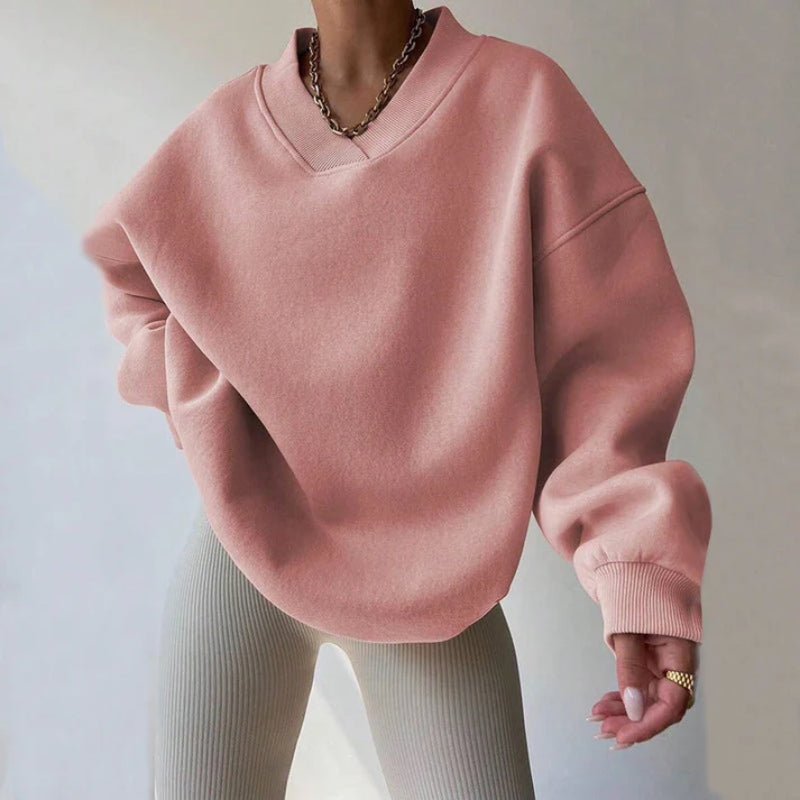Relaxed fit women's oversized pullover for versatile casual wear. Cozy, soft, and stylish for ultimate comfort.