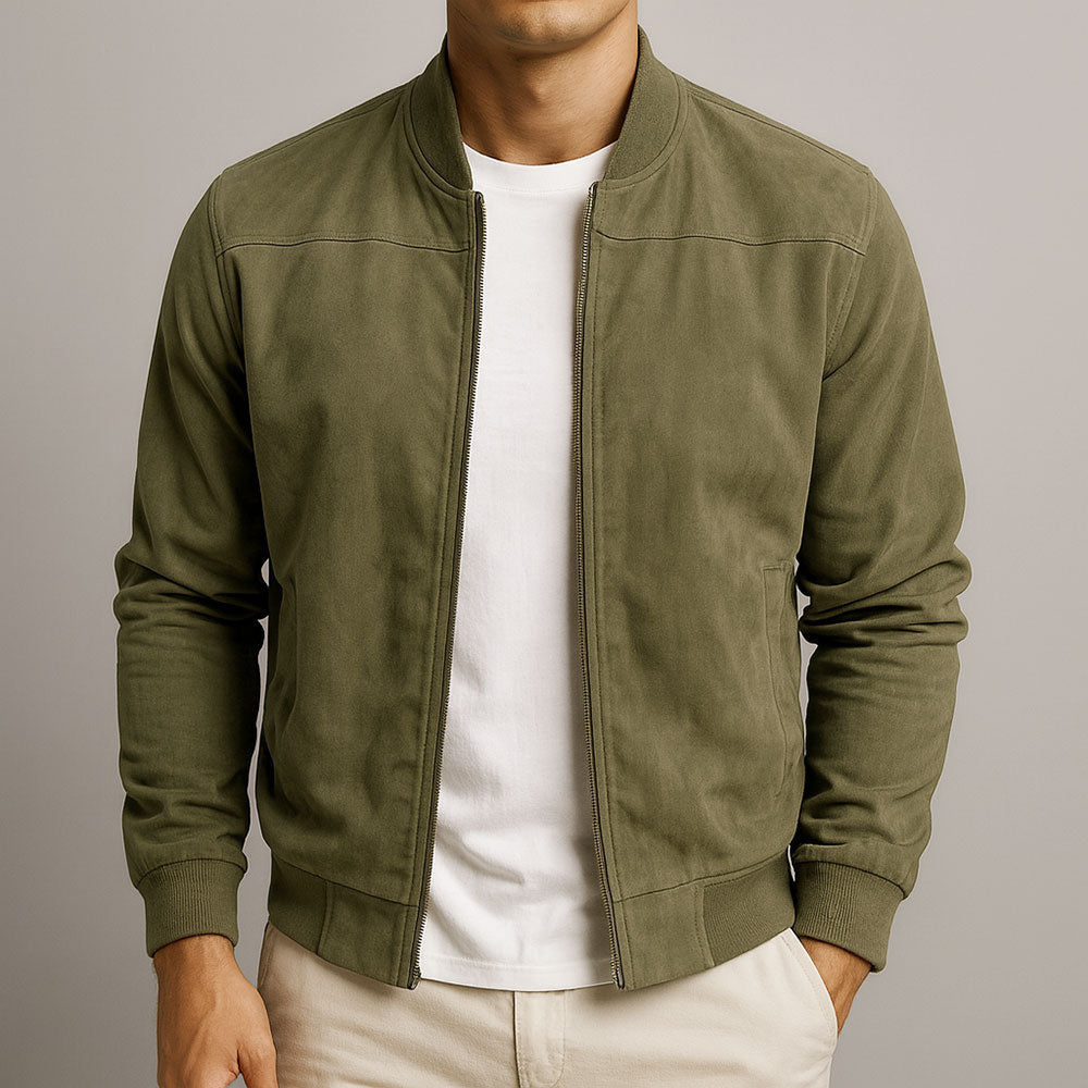 Navy men's bomber jacket, a sleek layering piece for versatile urban style. Modern fit outerwear.