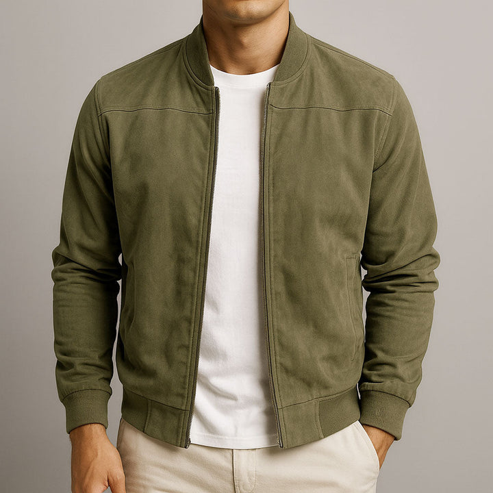 Navy men's bomber jacket, a sleek layering piece for versatile urban style. Modern fit outerwear.