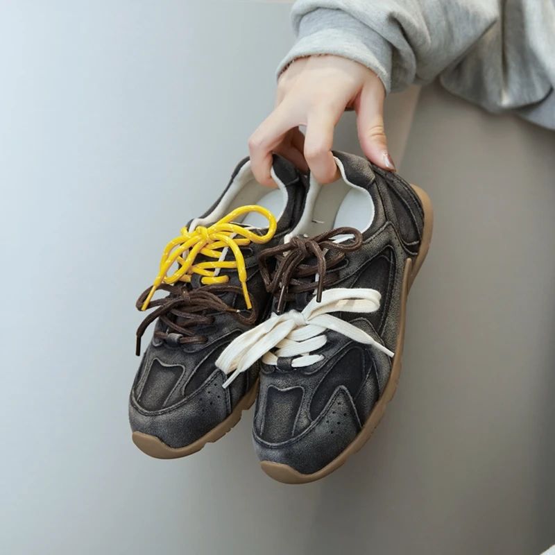 Modern men's fashion footwear: stylish double lace casual sneakers, comfortable for daily wear.