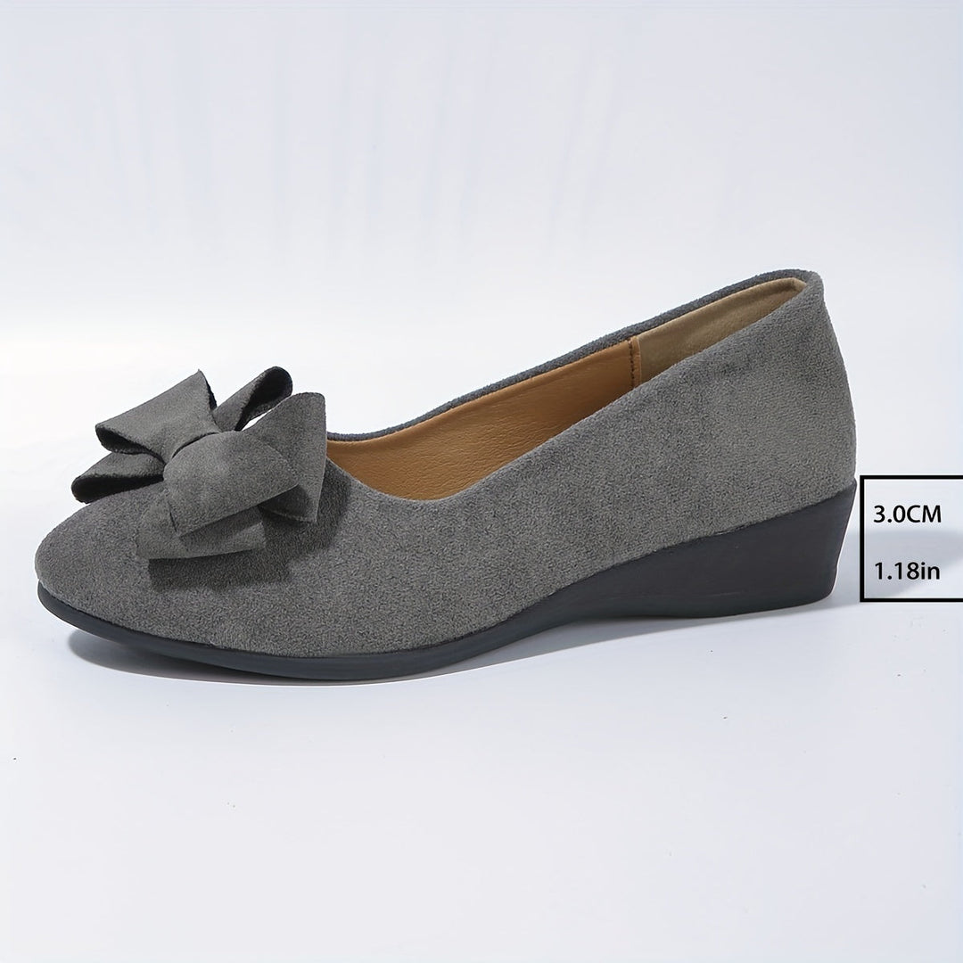 Stylish women's flats with bow detail, perfect for elegant daily wear.