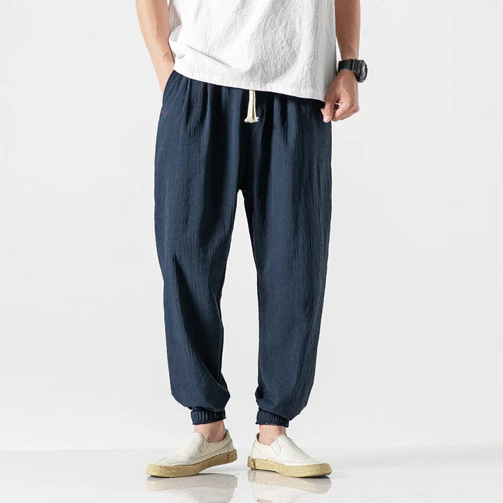 Men's casual tapered joggers with drawstring, ideal for lounging, exercise, and daily comfort with a modern fit.