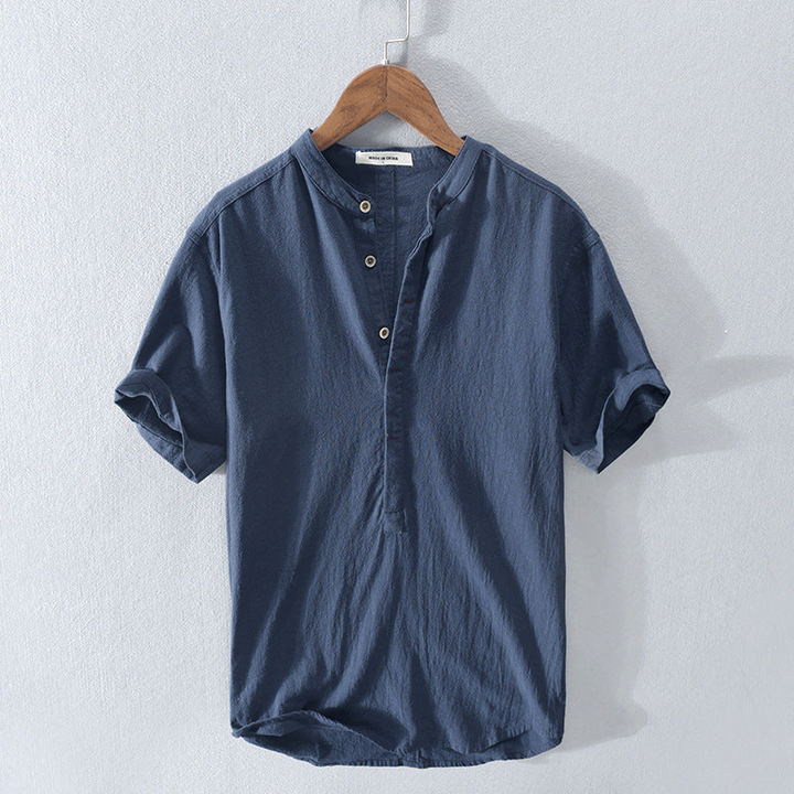 Men's versatile short sleeve Henley top with a relaxed fit, a must-have for summer fashion and casual style.