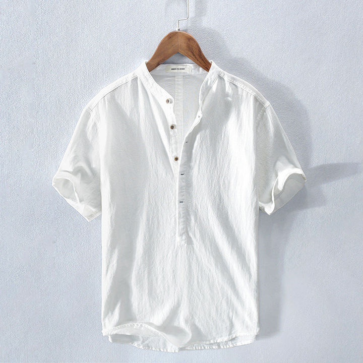 Men's relaxed fit short sleeve Henley top in soft fabric, perfect for casual summer wear and everyday comfort.