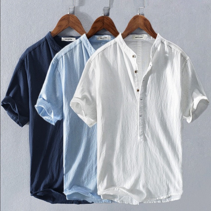 Stylish men's short sleeve Henley shirt, ideal for warm weather, summer fashion, vacations, and casual outings.