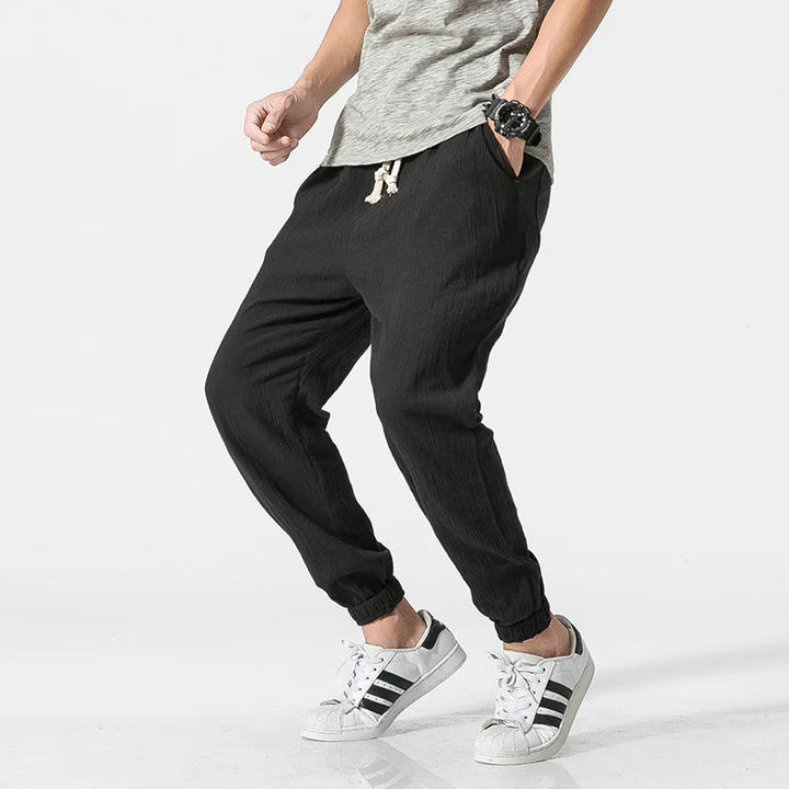 Comfortable men's relaxed fit tapered joggers, perfect everyday pants for modern casual style and lounging.