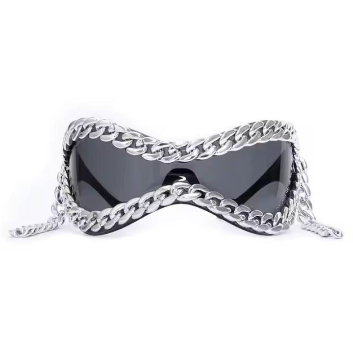 Bold unisex mirrored sunglasses with decorative chain accent. High-fashion eyewear statement.