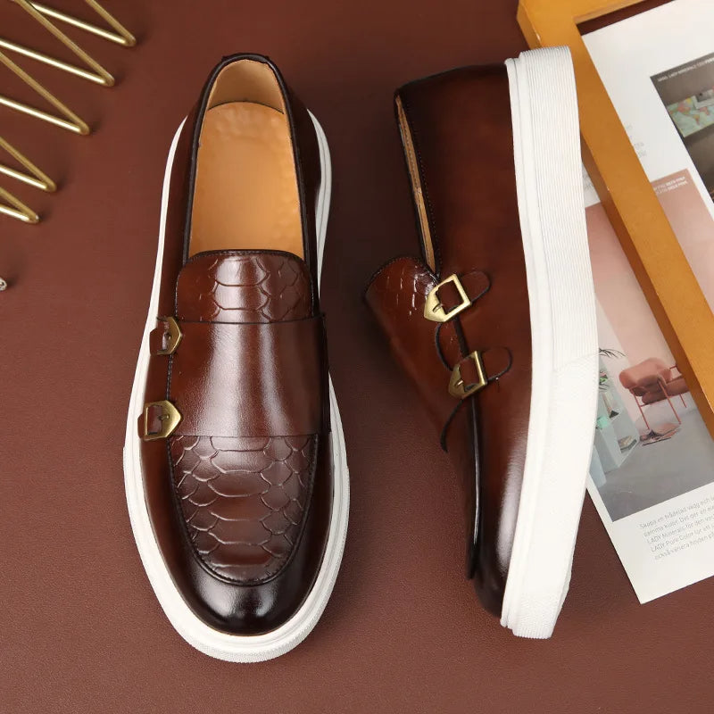 Sophisticated men's croc-embossed slip-on loafers. Features sleek double buckles & formal style.