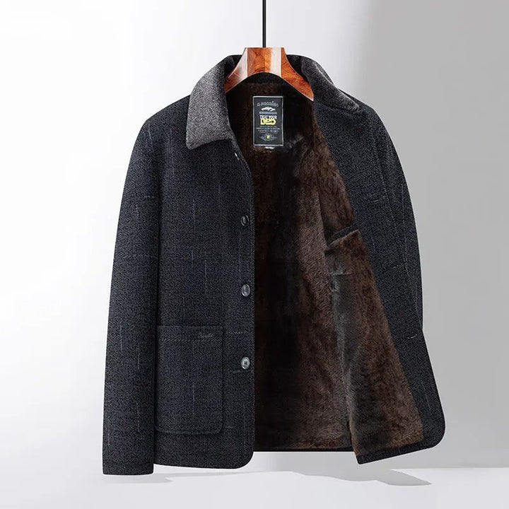 Close-up of men's tailored jacket featuring a sophisticated stand collar and classic button-front closure.