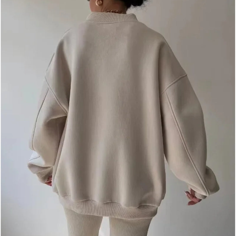 Stylish women's oversized pullover, ideal for fall & winter loungewear; soft, comfortable & versatile fashion.