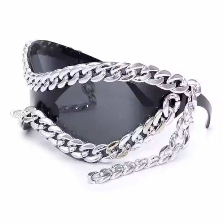 Modern unisex mirrored sunglasses featuring a distinctive chain accent. Fashionable eyewear accessory.
