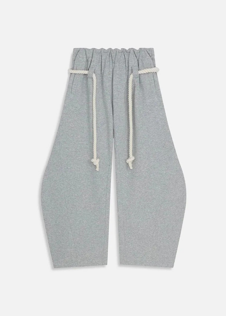 Trendy women's barrel leg sweatpants. High waist, modern baggy style for casual and streetwear looks.