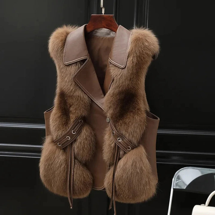 Elegant women's winter vest. Versatile layering piece, chic outerwear for sophisticated cold-weather fashion.