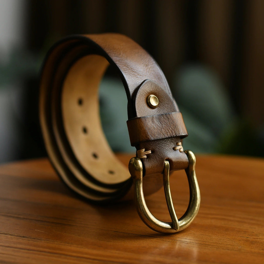 Classic men's full-grain leather belt. Versatile accessory perfect for formal or casual wear.