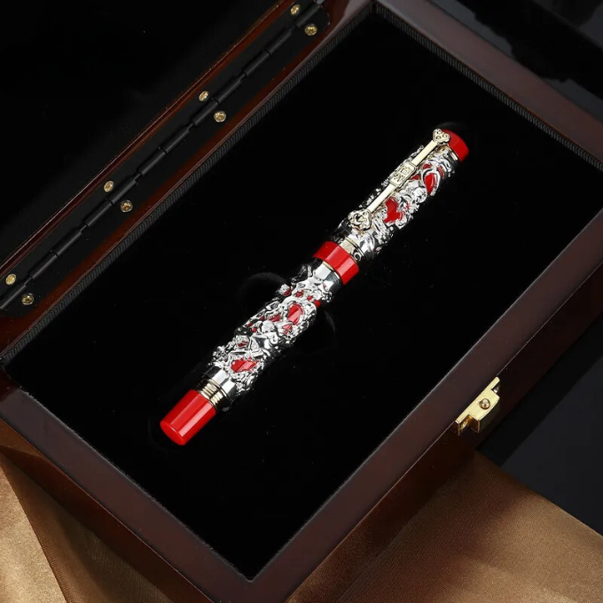 Elegant dragon fountain pen on a desk, essential for smooth writing, a premium luxury pen.