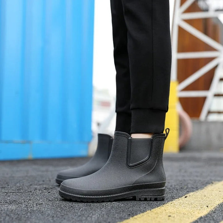 Easy slip-on waterproof platform Chelsea rain boots for women. Stylish ankle footwear for wet weather.