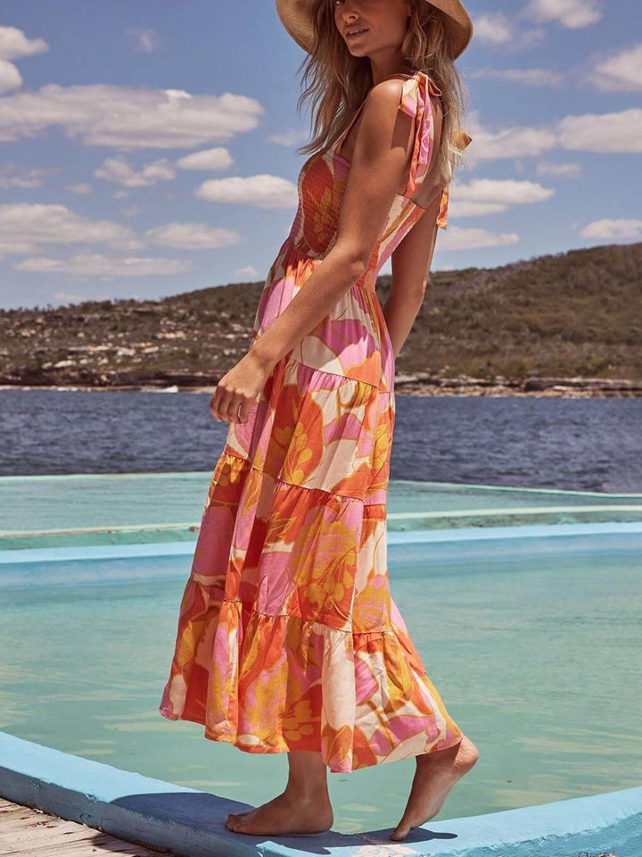 Multicolor women's sleeveless halter neck midi sundress, ideal for summer fashion & casual elegance. Versatile style.