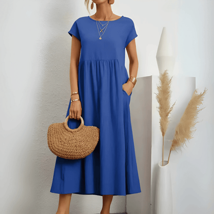 Casual yet chic women's summer dress, a vintage flowy maxi style with short sleeves and a loose, comfortable fit.