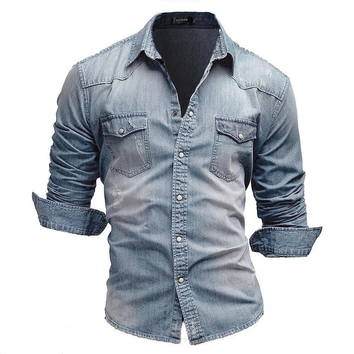 Rugged men's vintage wash denim shirt with chest pockets. Classic long sleeve button-down for casual fashion.