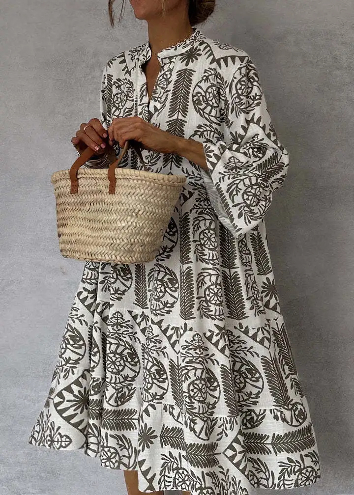 Elegant women's boho print oversized flowy midi dress, a long sleeve summer statement piece for effortless style.