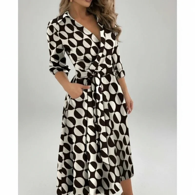 Flattering belted A-line midi dress for women, with a chic V-neck and 3/4 sleeves, offering effortless style.