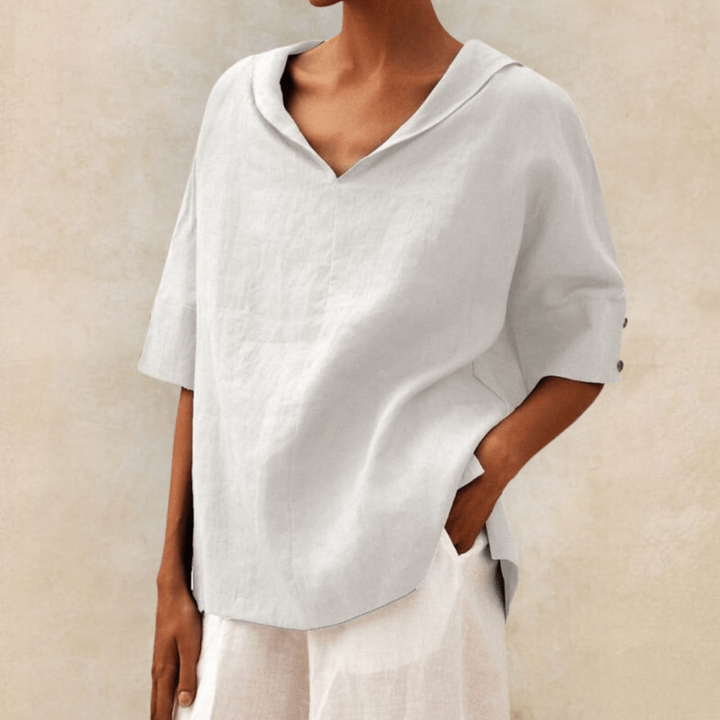Stylish women's short sleeve V-neck collared tunic top, designed for a relaxed fit. Great for casual everyday wear in warm weather.
