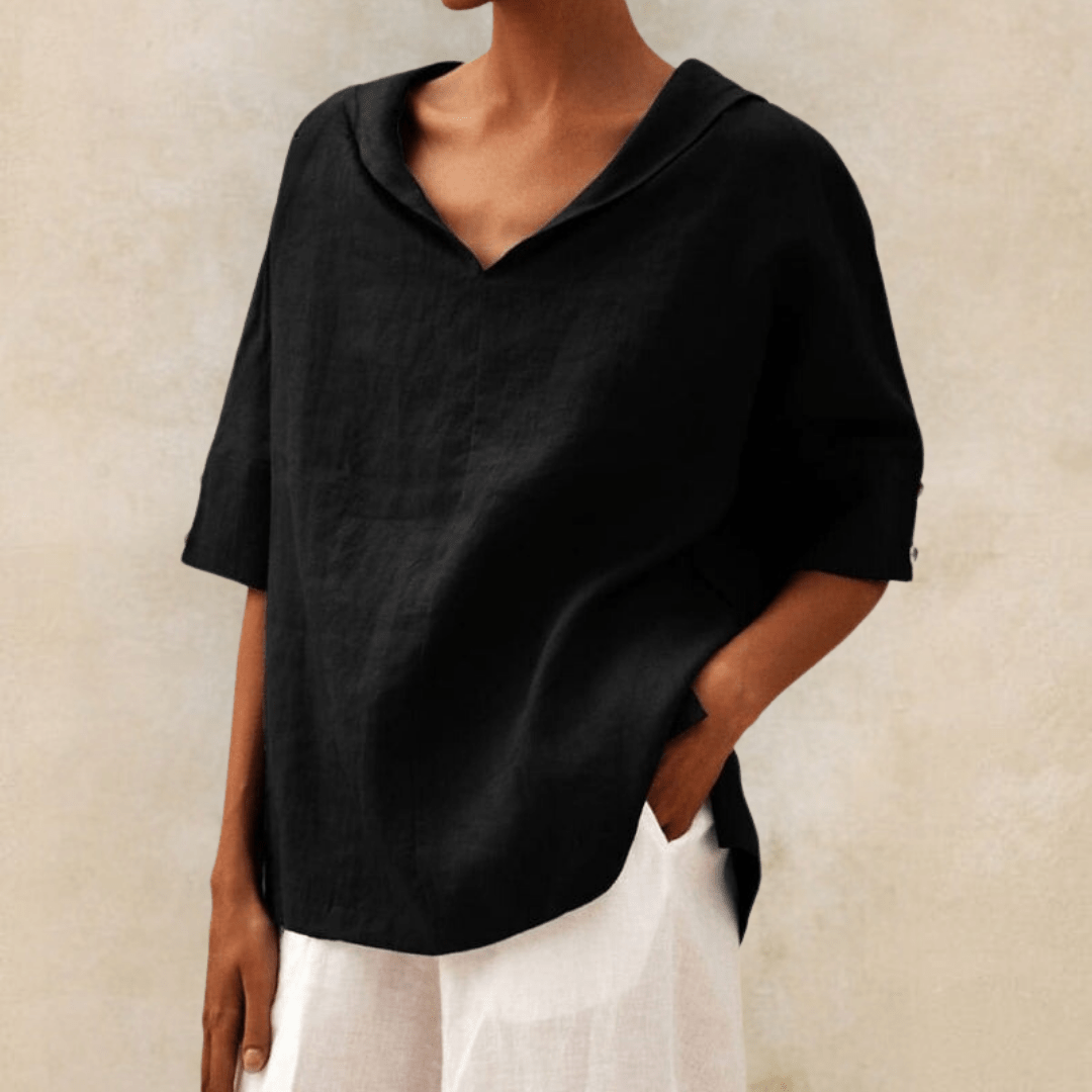Effortless women's V-neck tunic with collar, short sleeves & relaxed fit. A versatile, chic blouse for casual spring and summer days.