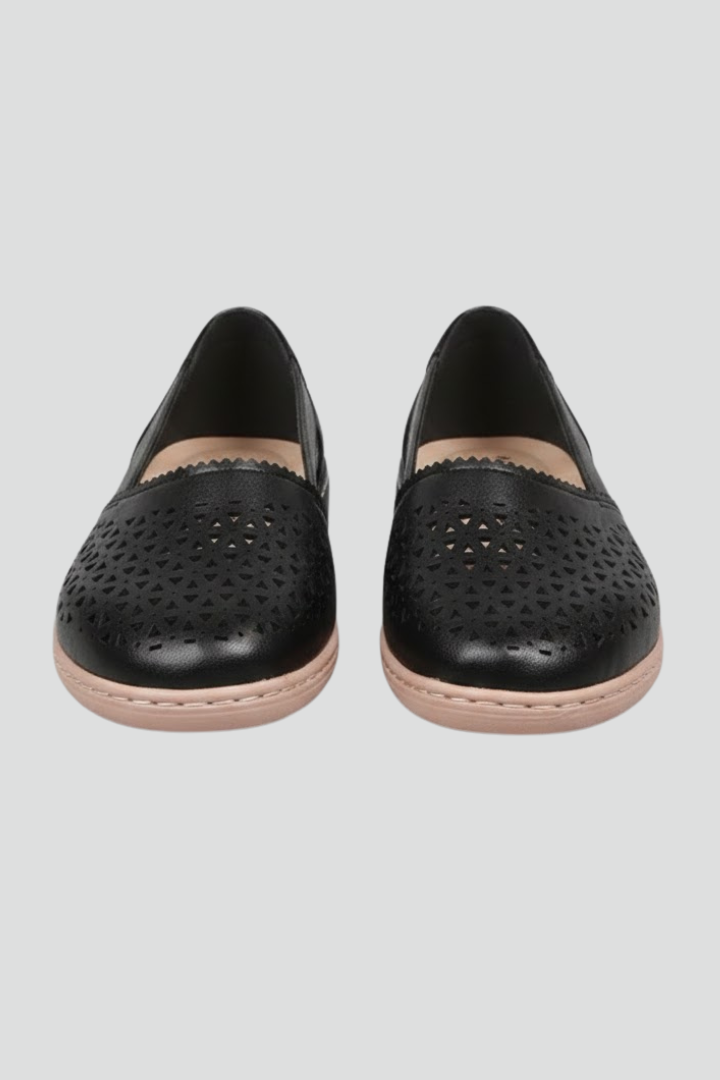 Women's everyday shoes with stylish cut-outs, sturdy sole, perfect for comfortable walking.