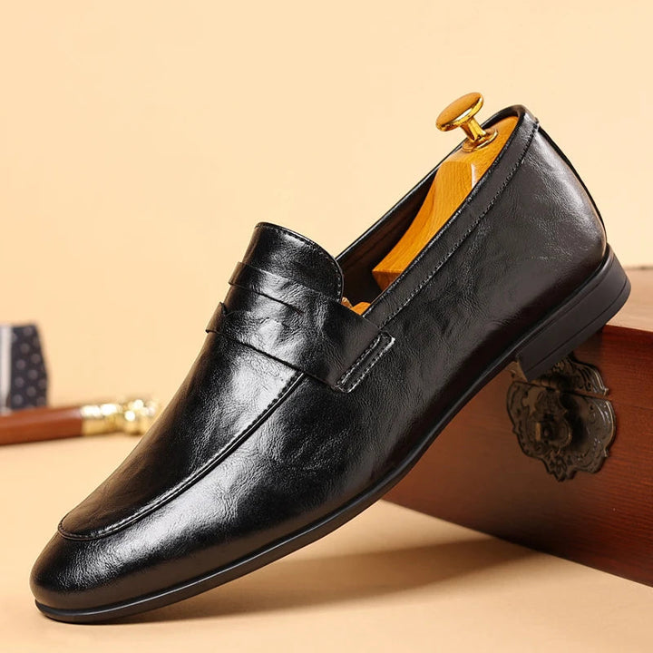 Front view of Men's Verona black formal slip-on loafers, suitable for office wear.