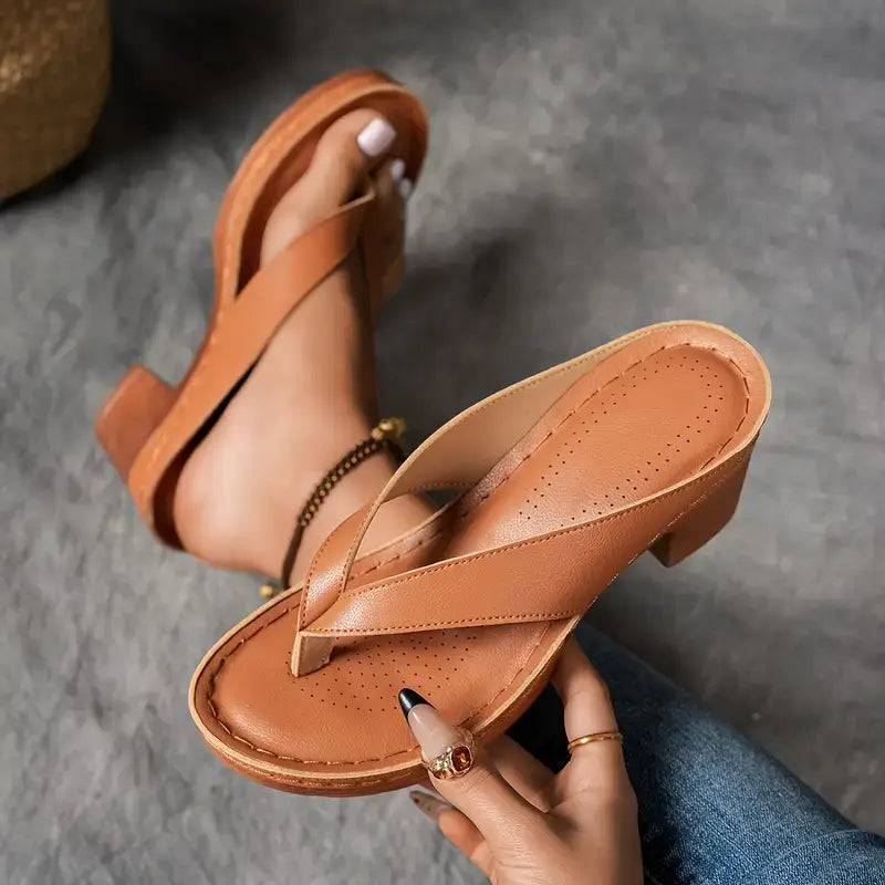 Open-toe heeled sandals for women with comfortable orthopedic support. Strappy design, ideal for summer fashion.